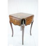French Mahogany and Parquetry Inlaid Table with Four Drop Flaps raised on cabriole legs with gilt