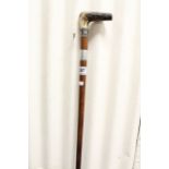 A vintage sword stick with antler handle.