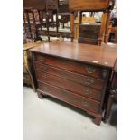 19th Century mahogany chest of 4 long drawers raised on bracket feet