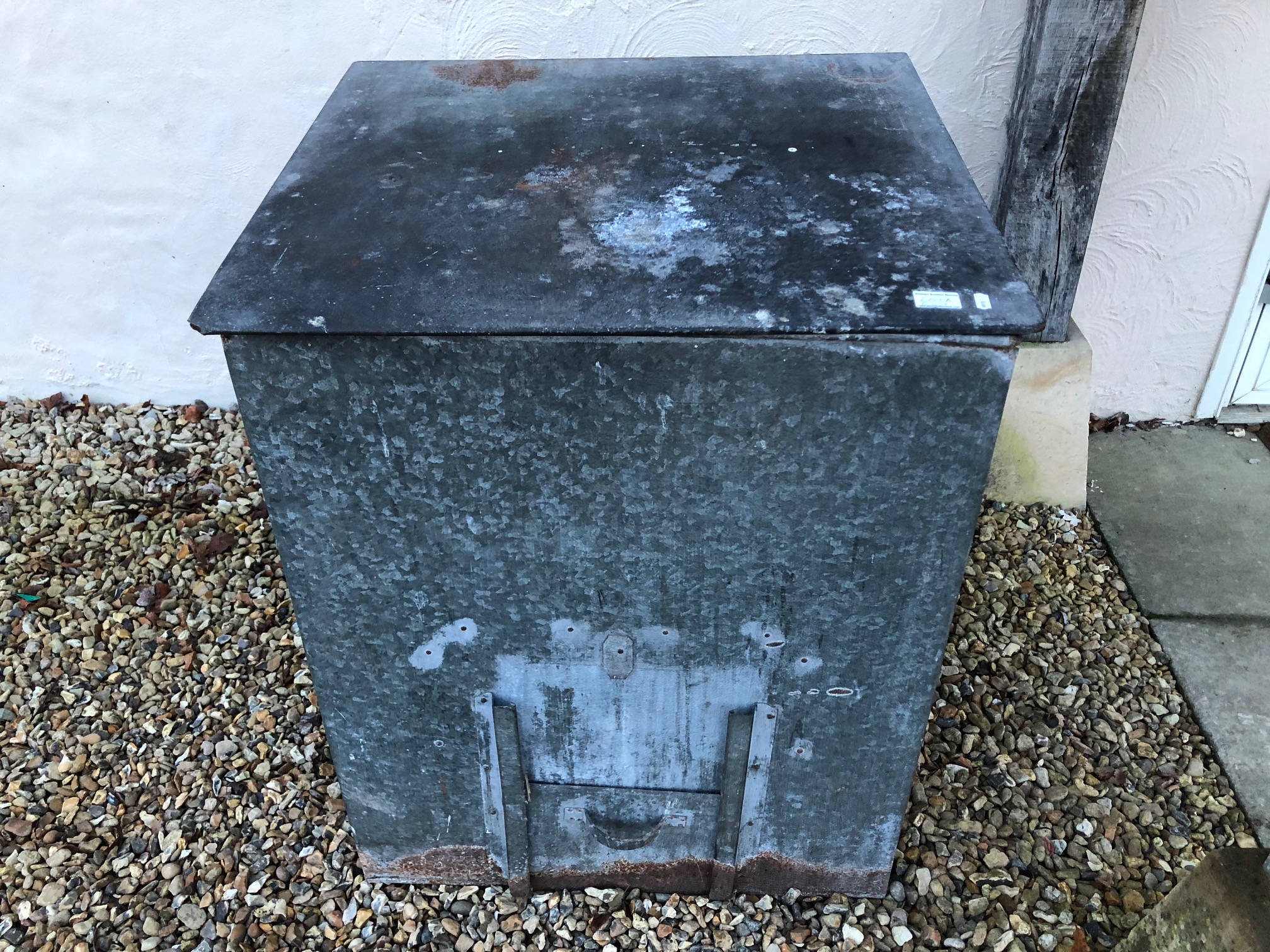 Galvanized metal coal bunker