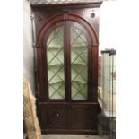 Early 19th century Inlaid Mahogany Large Corner Cabinet with dentil frieze above barrel back with