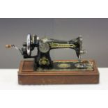 Cased "Standard" hand operated sewing machine