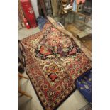 Large Red and Blue Ground Rug with Floral and Geometric Patterns