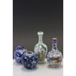 Two Oriental vases, one with four character mark to base and two blue & white Ginger jars
