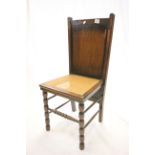 Edwardian Oak Trouser Press Chair with solid back and cane seat