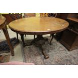 Victorian Walnut Tilt Top Oval Loo Table on pedestal base