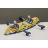 Tinplate Mobo Canoe model of rowing Clowns, marked "Made in England" to base