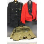 A quantity of military dress uniforms.
