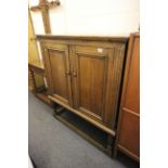 Mid 20th century Oak Jacobean Style Side Cabinet with two doors opening to reveal shelves