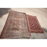 Two Eastern Red Ground Wool Rugs