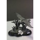 Spelter model of a flying Swan