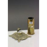 Brass inkstand with ceramic liner and a 1950's brass shell case