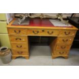 Twin Pedestal Desk with red leather inset top and pine effect finish