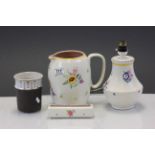 Four vintage Poole pottery items to include a large jug and a Poole Studio vase