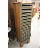 Contemporary Tall Pine Chest of Fourteen Drawers with open green painted fronts