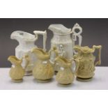 Group of six early 19th Century stoneware jugs to include Bacchus themed