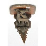 Late 19th / Early 20th century Black Forest Wall Bracket carved with a Stag and Foliage