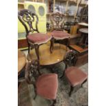 Set of Four Victorian Mahogany Dining Chairs with Ornate Carved Backs, Stuffed Seats and Cabriole