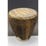 A large vintage zebra skin african drum.