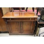 Victorian Mahogany Side Cabinet with overhanging top drawer over two cupboard doors