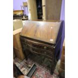 Mahogany Veneered Bureau with serpentine front drawers and cabriole legs