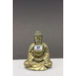 Brass Buddha figure in seated position