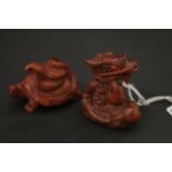 Two wooden netsukes to include Snake on a Turtle and a Chinese Dragon