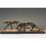 Art Deco pair of Bronzed effect Panthers on a wooden plinth base