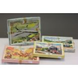 Four boxed wooden Victory Jigsaw puzzles