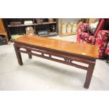 Chinese Stained Wooden Long Low Table with open carved frieze and raised on square legs