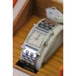Ladies boxed stainless steel Hermes "H" hour wristwatch with Diamond bezel, with original paperwork