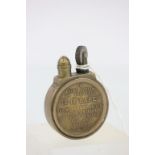 A trench light, the front with verse "In every action ask yourself is it safe? This will disclose