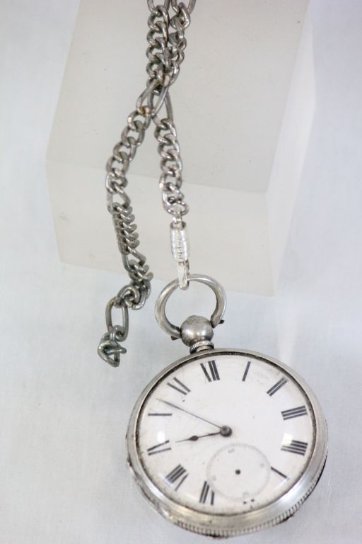 Victorian Silver Cased Pocket Watch with a chain