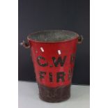 Red painted GWR Fire bucket, marked to the side and with a swing handle