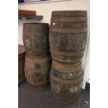 Four wooden vintage beer barrels inscribed Wadsworth Devizes and Stroud