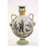 An antique tin glazed Majolica twin vase decorated with man, dog and bull jumping fence
