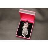 A silver marcasite and ruby fox pendant necklace