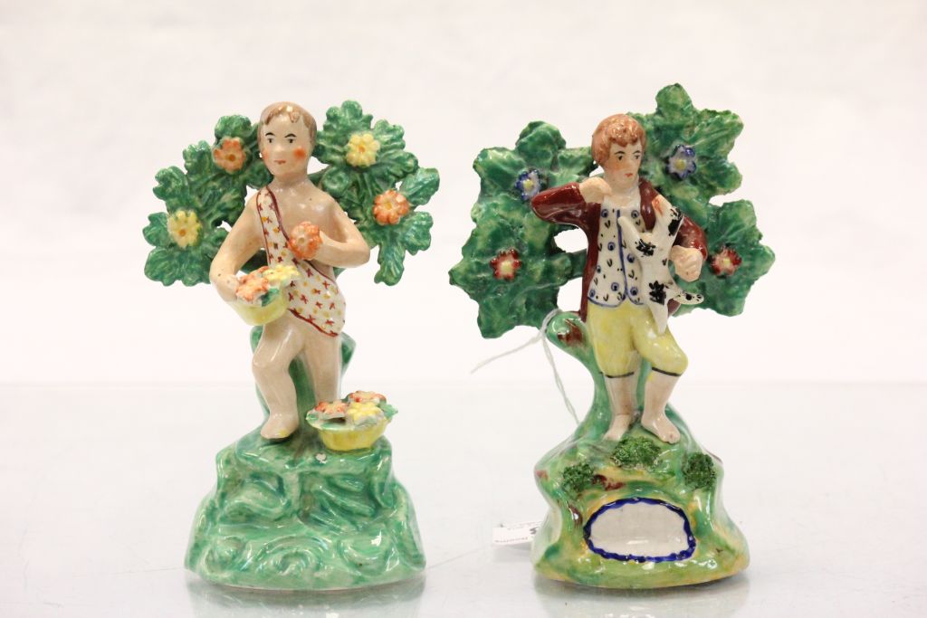 A pair of 19th Century Staffordshire figures