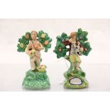 A pair of 19th Century Staffordshire figures