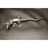 A vintage bronze lizard indistinctly signed