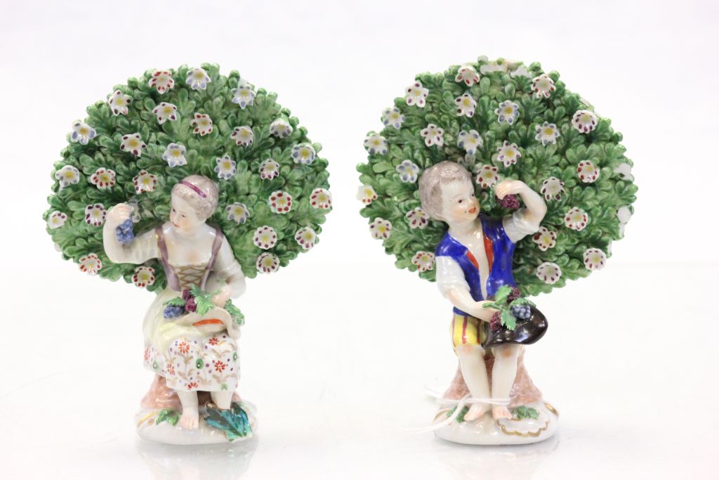 Pair of 19th Century Continental figures of a boy & girl eating Grapes