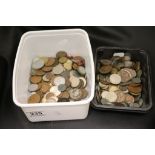 A tub of assorted coins