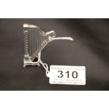 An unusual silver harp