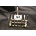 A George V silver seven bar toast rack of arched form, Sheffield 1916 James Dixon and Sons Ltd,