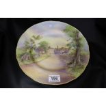 A Royal Worcester large handpainted plate, "Tewkesbury" signed D WIlson to lower right, impressed