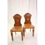 Pair of Victorian Oak Hall Chairs with Carved Backs and Solid Seats