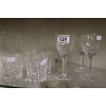A set of 6 cut glass crystal wine glasses together with a set of six cut glass Waverley crystal