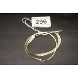 A 9ct bi-colour gold plated bracelet, length approximately 70mm, together with a 9ct gold fine