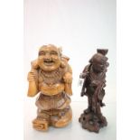 Two carved Oriental hardwood figures