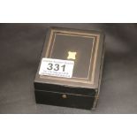 A Victorian wooden pocket watch box with brass cartouche (af)